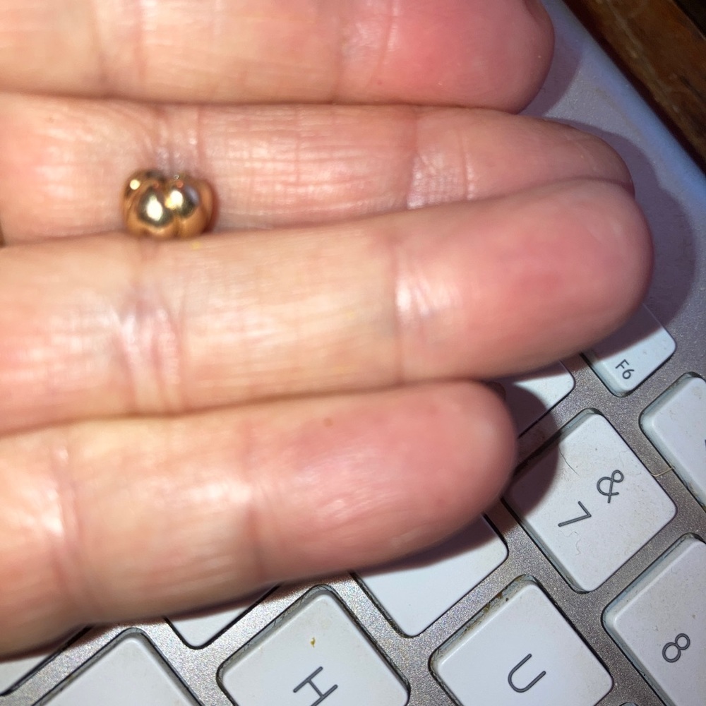 Authentic 18K gold troll bead hearts